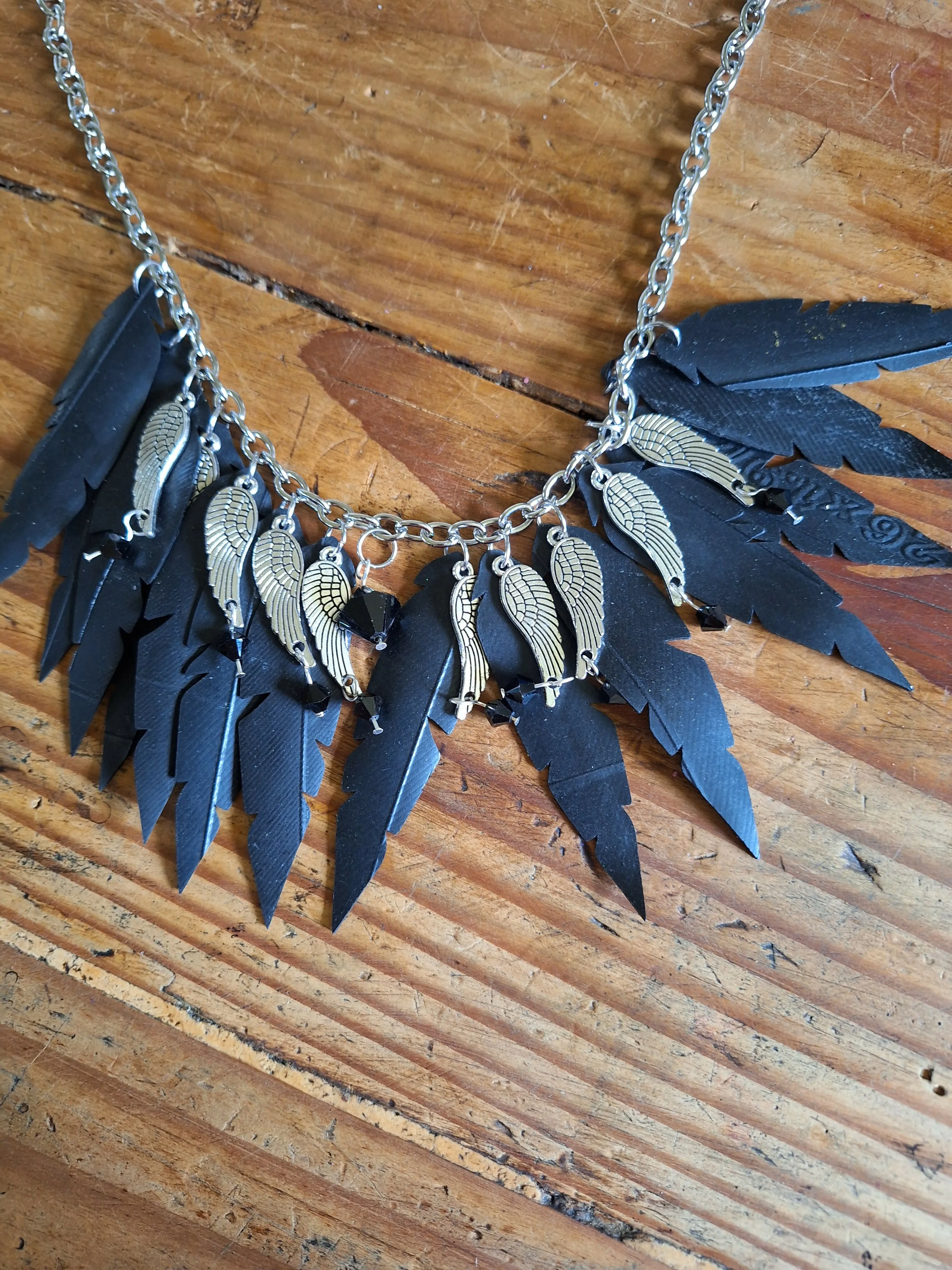 Joyce Pierce - Inner Tube Feather Necklace Black Swavorski Crystals and wings