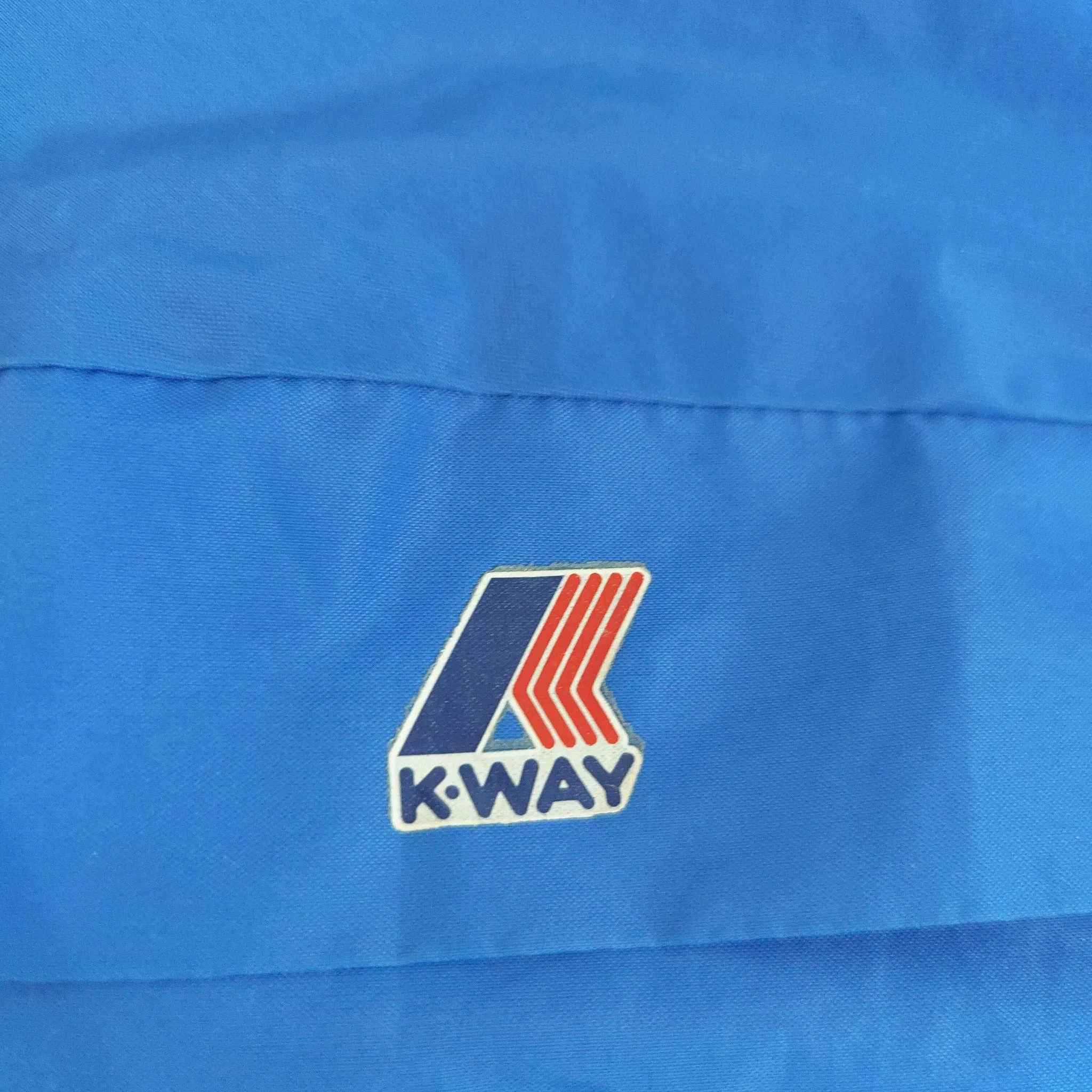 Vintage blue K-Way rain jacket